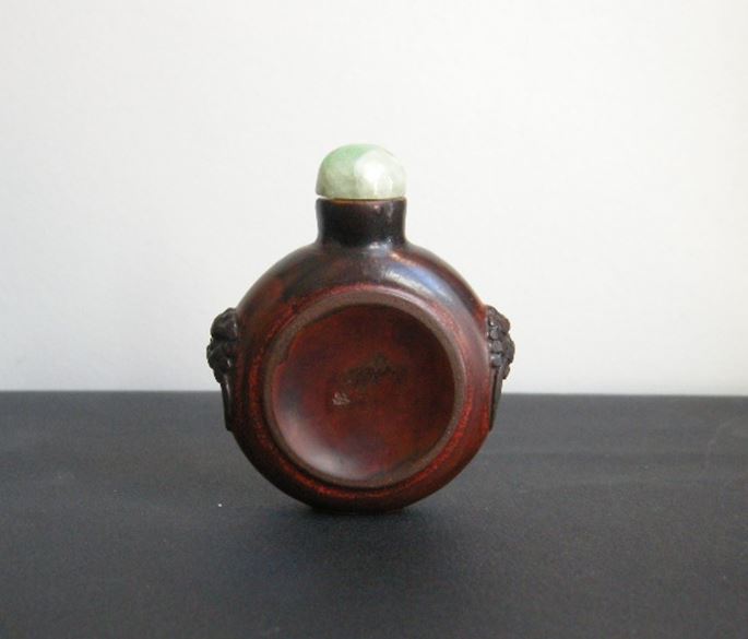 Rare snuff bottle carved wood with masks on the shoulders. each side carved in the shape of a tobacco cup | MasterArt